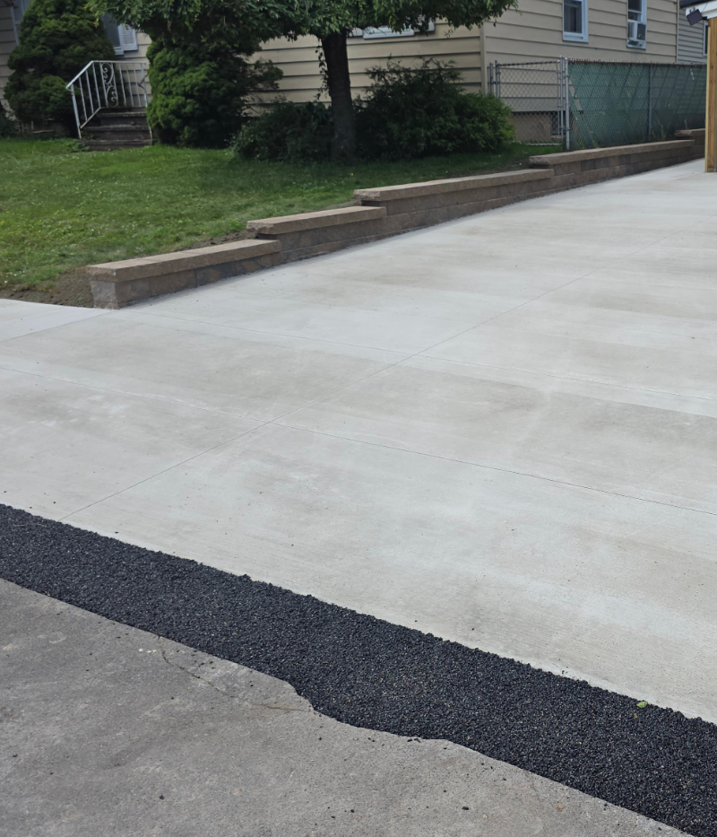 Skilled Concrete Contractor Pouring and Finishing Slabs in Baldwinsville, NY